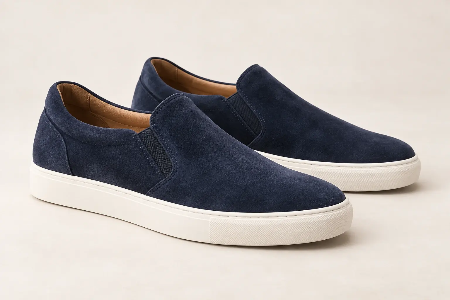 AI illustration of original navy suede sneakers with elastic side inserts and no laces.